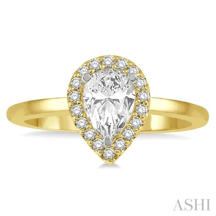 5/8 Ctw Pear and Round Cut Diamond Ladies Engagement Ring with 1/2 Ct Pear Cut Center Stone in 14K Yellow and White Gold