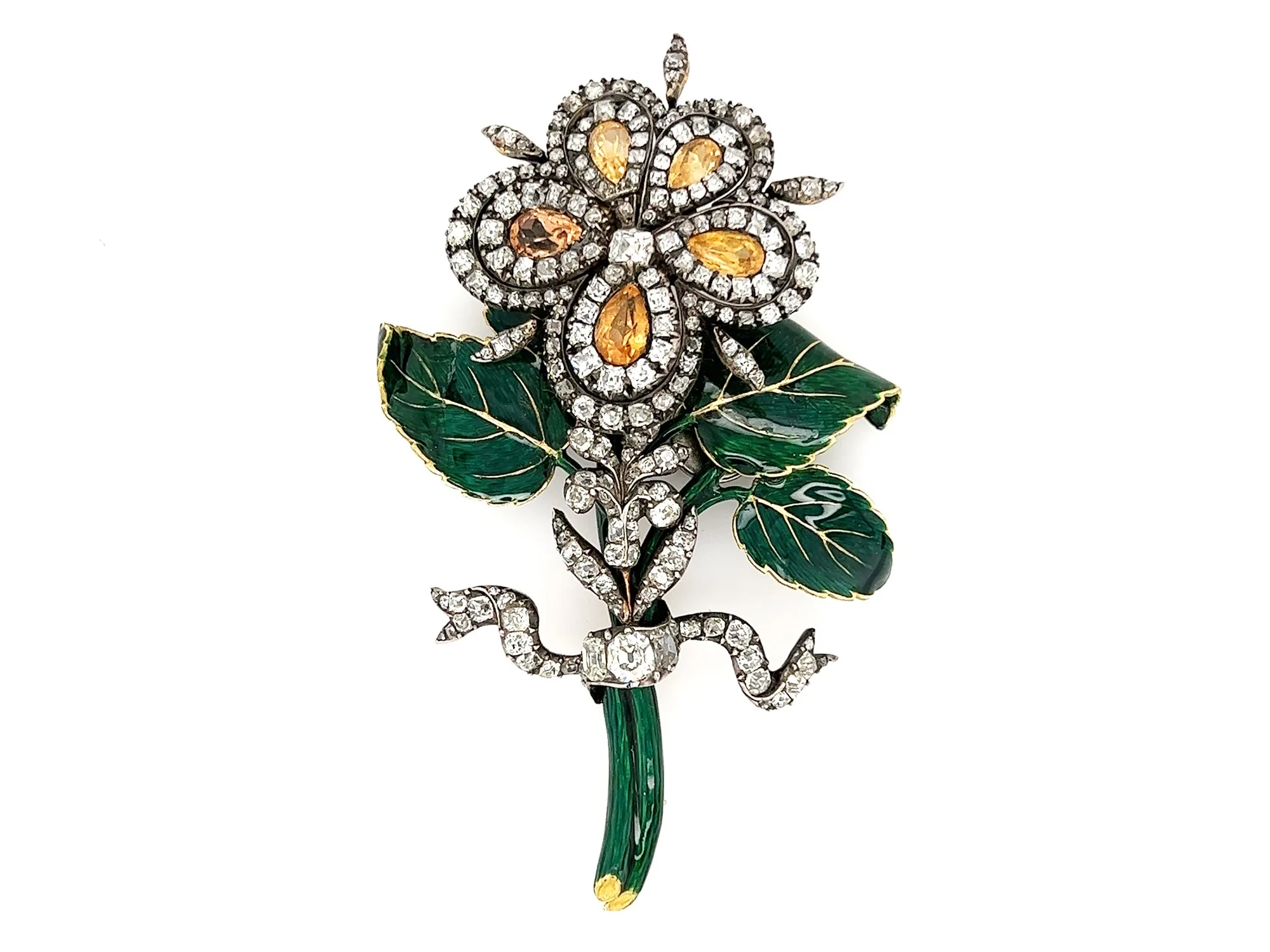 A XIX Century antique en tremblent brooch. The flower in silver topped Yellow gold with old-cut diamonds and topaz